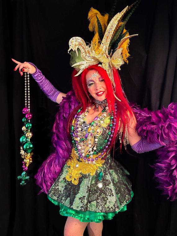 Madelyn Greco with feathers and beads