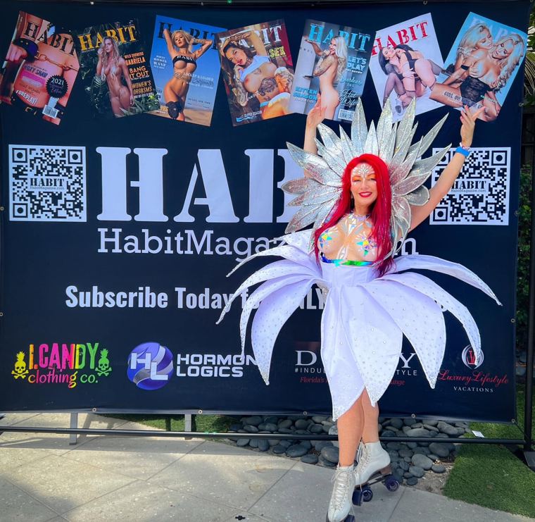 Madelyn Greco on roller skates in a white flower costume