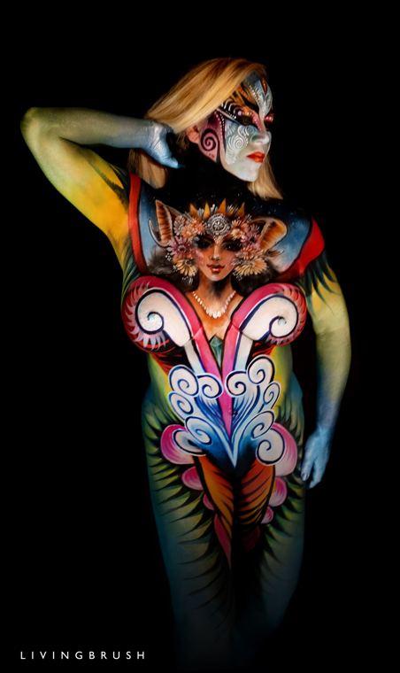 Model bodypainted with pink and green ornament