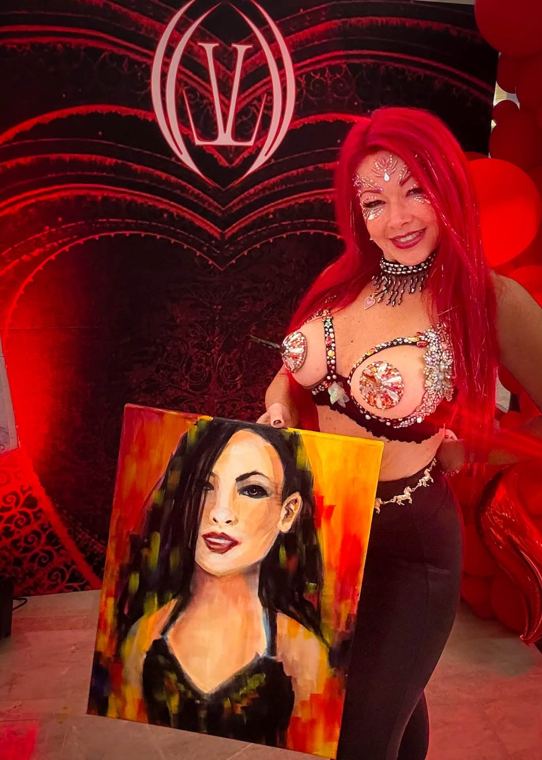 Madelyn Greco with a portrait at an event