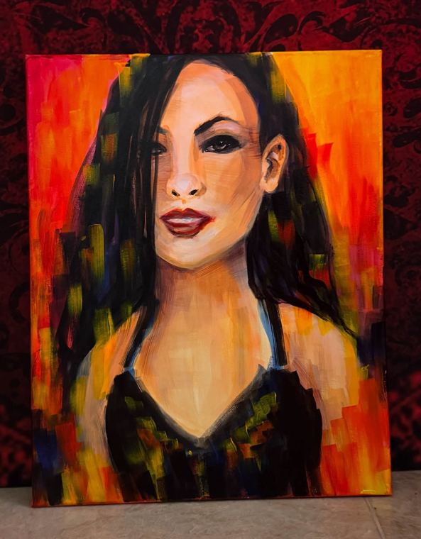 Finished portrait in red, gold and black